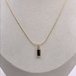 Stainless steel yellow gold baguette pendant necklace